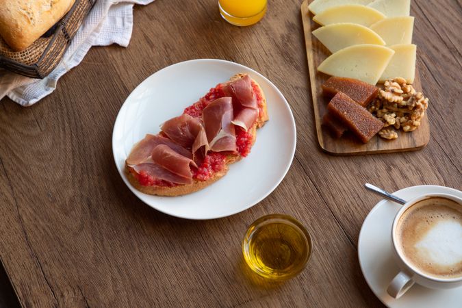 Stylish serving dishes with sandwich for breakfast