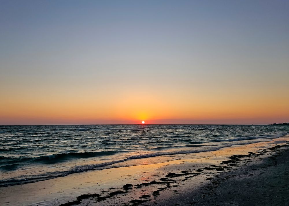 Golden sunset over tranquil waters