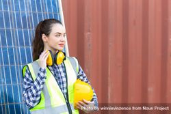 Portrait of female worker or engineer woman in safety uniform and helmet at construction site 4Nom8b