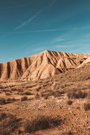 Desert cliffs under blue sky in landscape