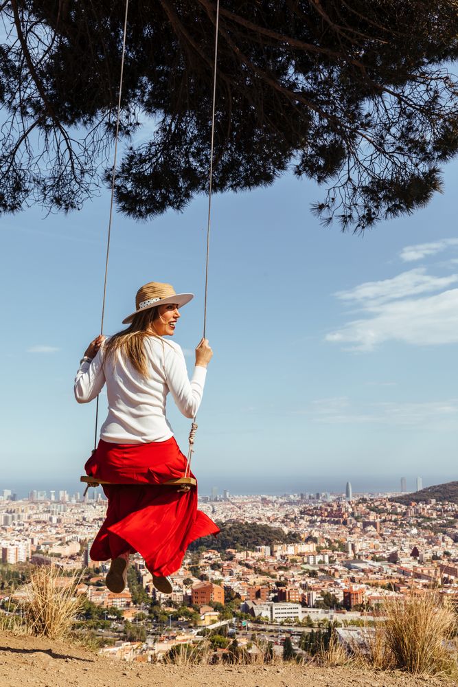 Woman having fun on a swing