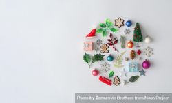 Flat lay of Christmas cookies and decorations in circle 5rkZ24