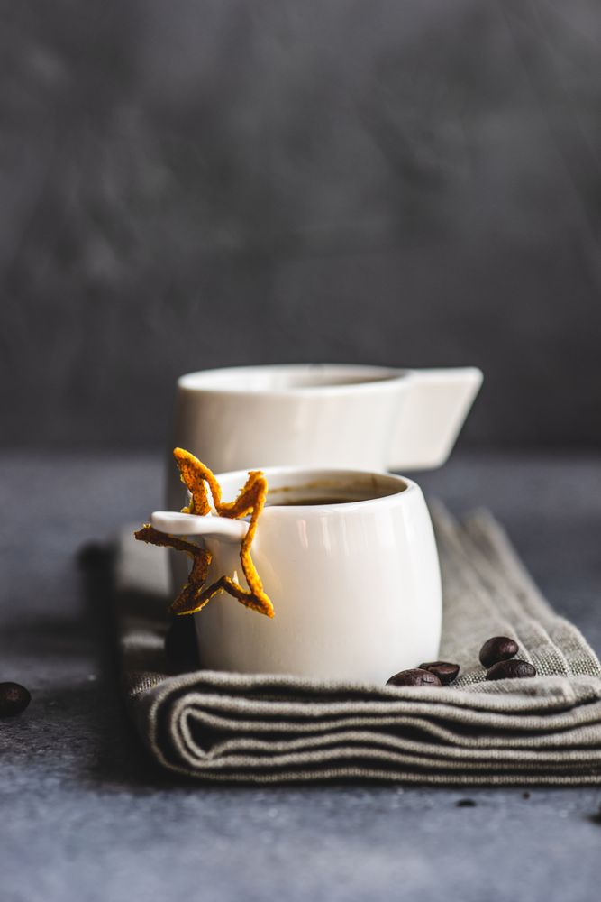 Two cups of coffee with star garnish