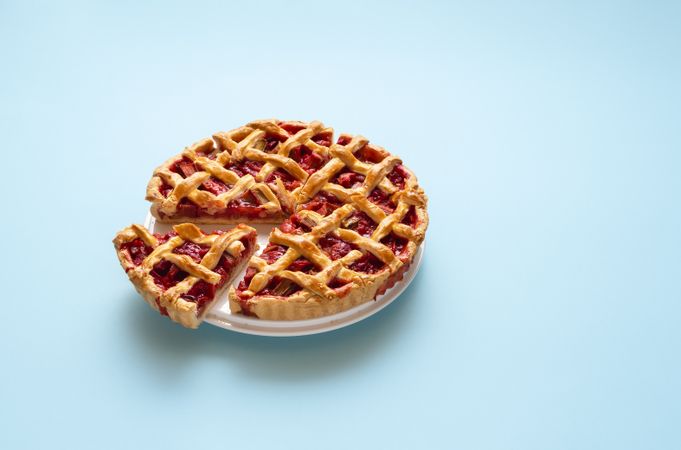 Fresh rhubarb pie with a lattice crust on a plate