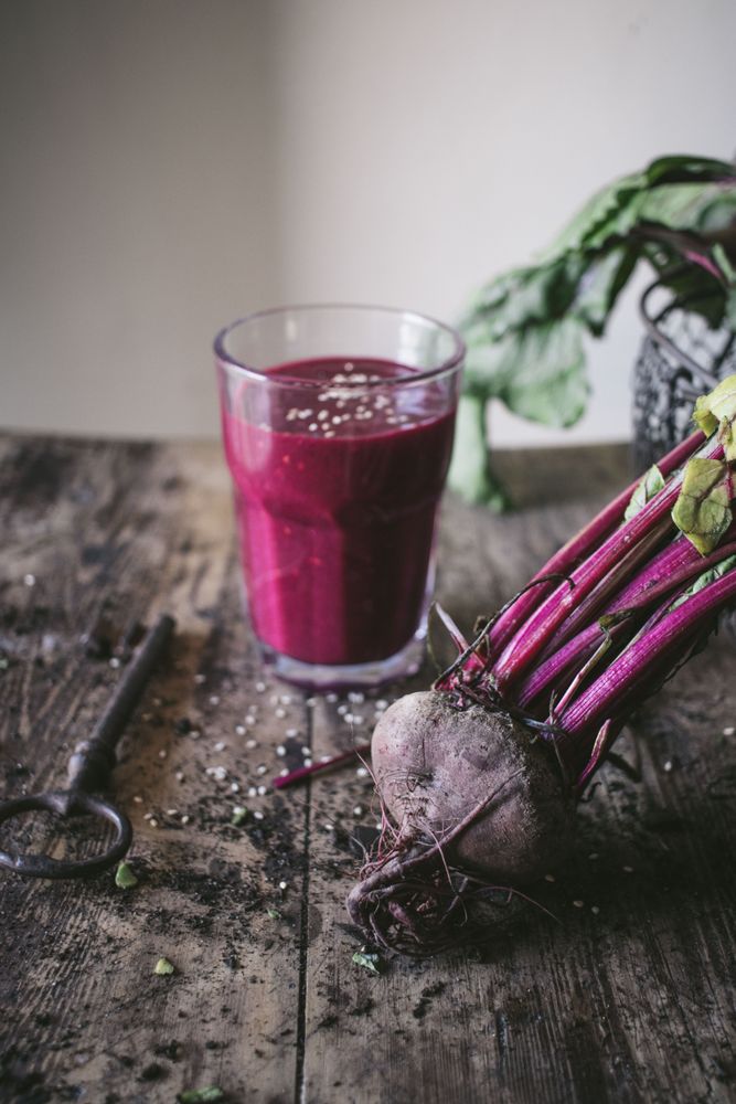 Beetroot and fresh smoothie on wooden table