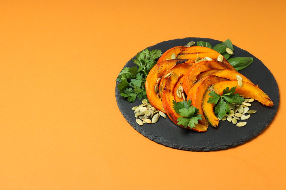 Concept of tasty homemade dish - baked pumpkin
