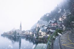 Snow falling over Hallstatt village