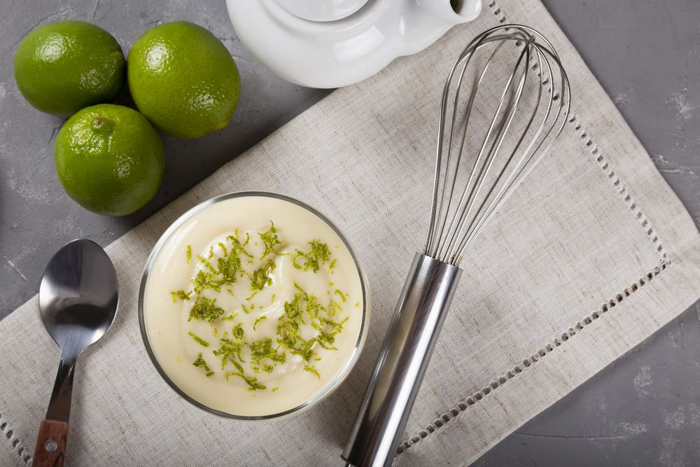 Lemon mousse with lemon zest on top.