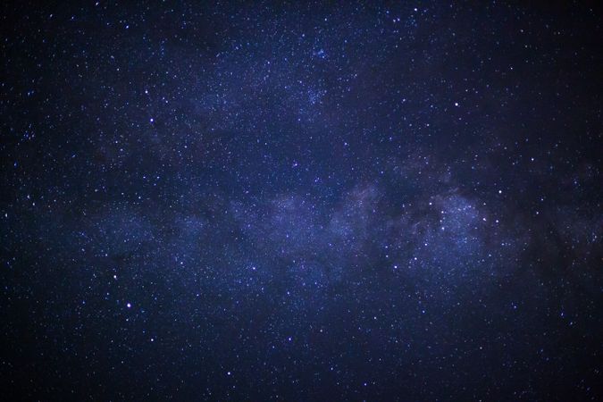 milky way galaxy with cloud and space dust in the universe, Long exposure photograph, with grain.