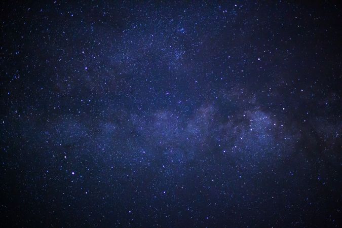 milky way galaxy with cloud and space dust in the universe, Long exposure photograph, with grain.