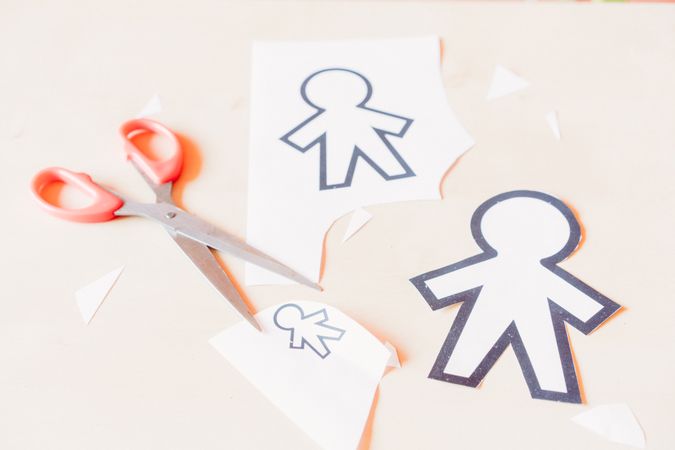 Funny paper toys near scissors