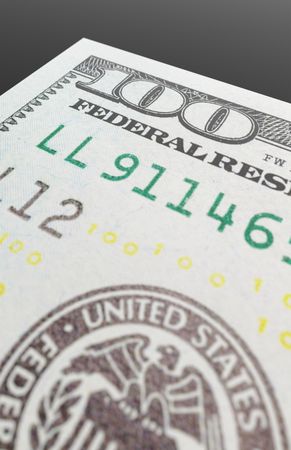 One Hundred Dollar Bills Close-up Abstact.