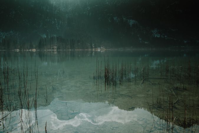 Dark shallow water with crystal water in mountains