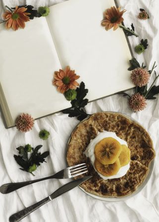 Crepes with cream and persimmon