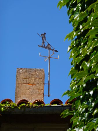 Weather vane: a salt pan farmer or a paludier