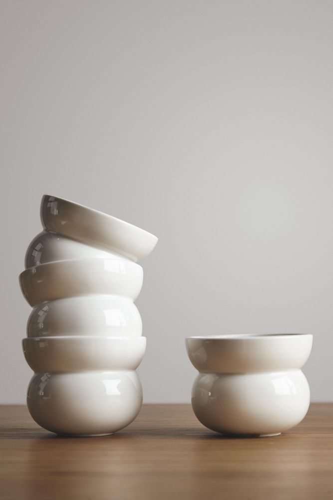 Two stacks of coffee cups