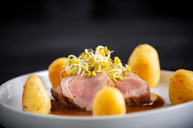 Duroc sirloin with orange ginger soy and potatoes