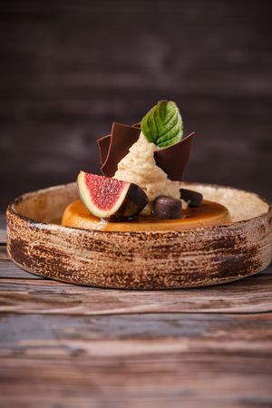 Sweet cheesecake served in ceramic plate