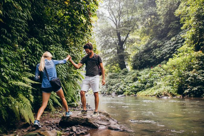 Couple of hikers in forest