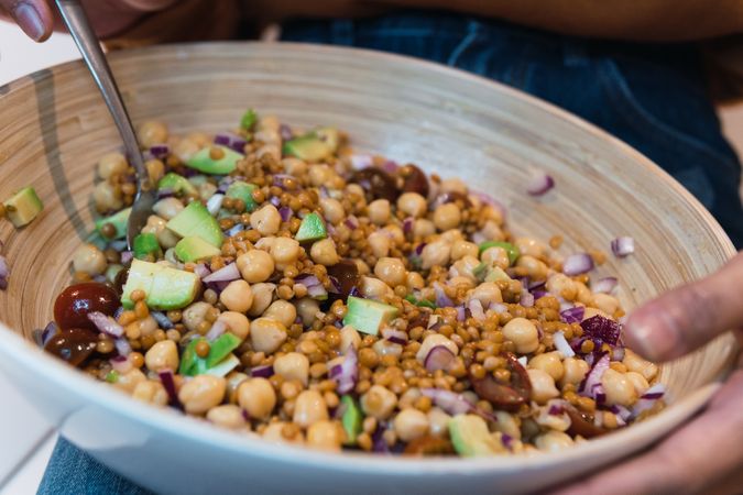 Black woman eating healthy salad