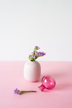 Violet sea lavendar and white backgrounder flowers in a pink