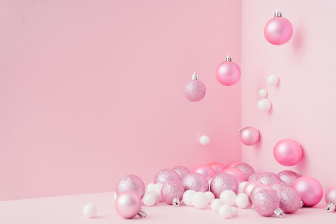 Baubles in a variety of pink shades in corner of pink room