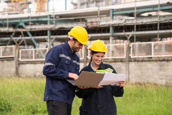 Engineer worker checking project at petrochemical factory or refinery oil plant industrial.