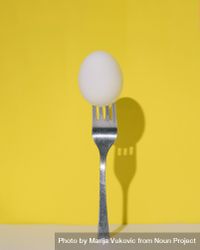 Hard boiled egg on fork 5zDpNb