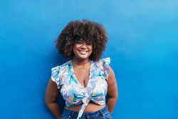 Woman on a blue background on a summer's day