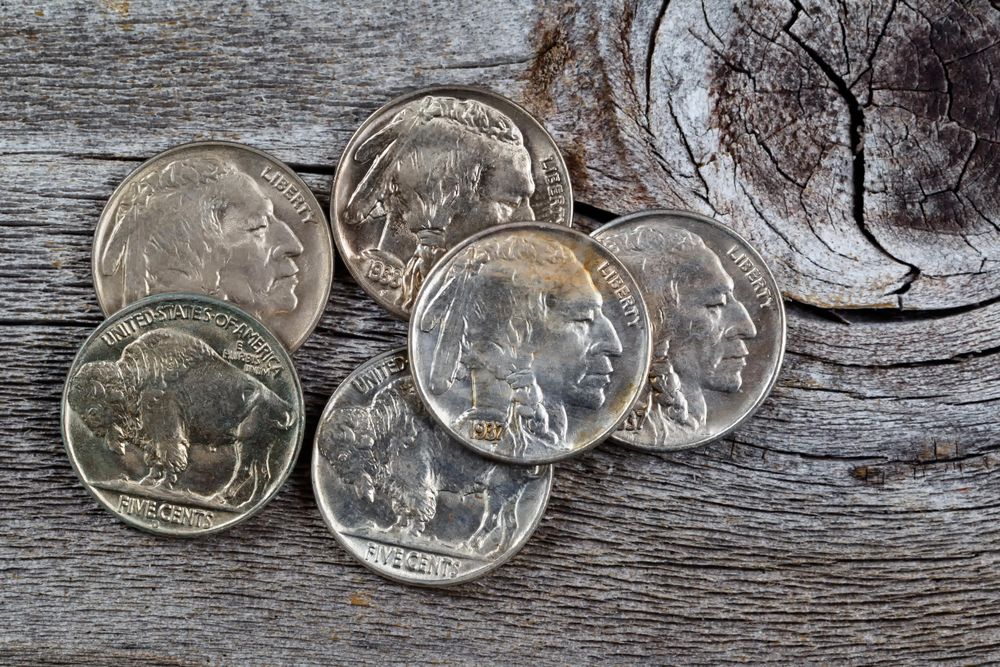 Vintage American Coins on rustic wood