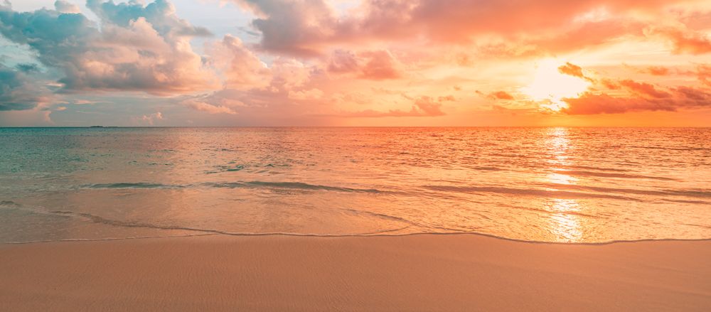 Wide shot of beautiful sunset in the Maldives