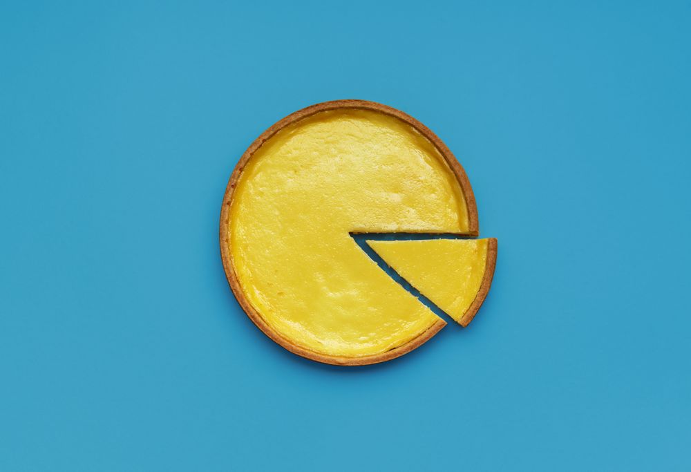 Homemade cheese pie minimalist on a blue table