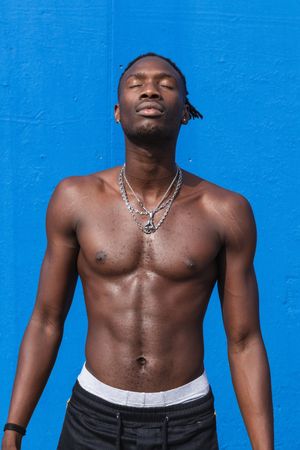 Muscular Black man with naked torso
