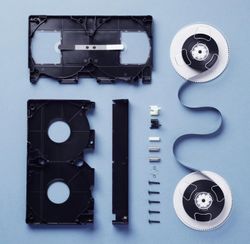 Components of a VHS Cassette disassembled