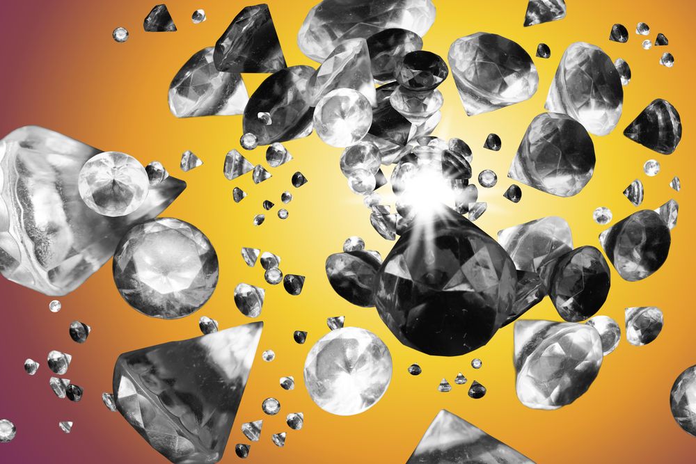 Scattered gems on gradient yellow orange background