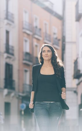 Young female walking on the street