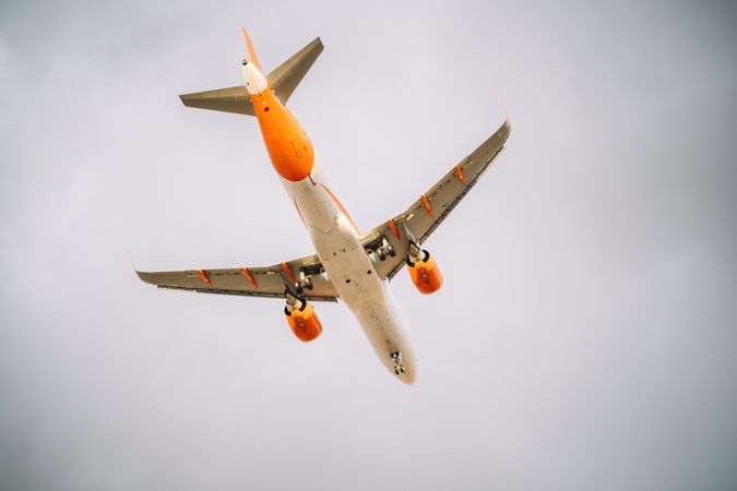Big plane under grey sky