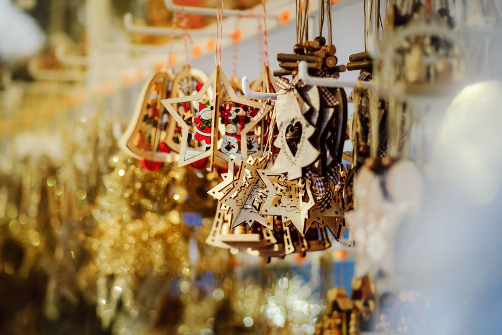 Christmas decorations on wall in market with selective focus