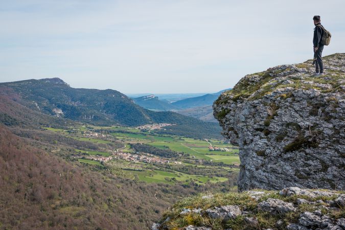Tourist standing on high mountain