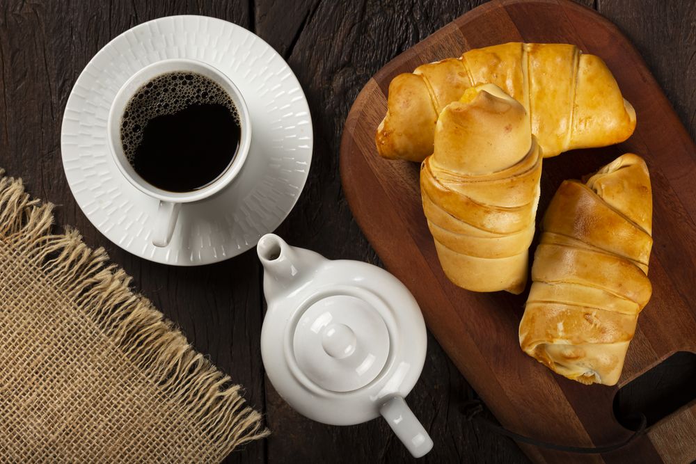 Traditional fresh baked croissants on the table.