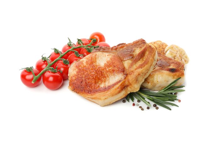 Fried steaks isolated on blank background. Grilled food