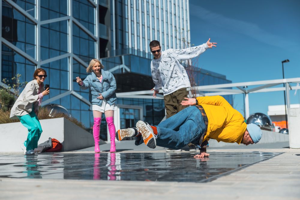 Vibrant Outdoor Scene Capturing A Diverse Group Of Young Adults