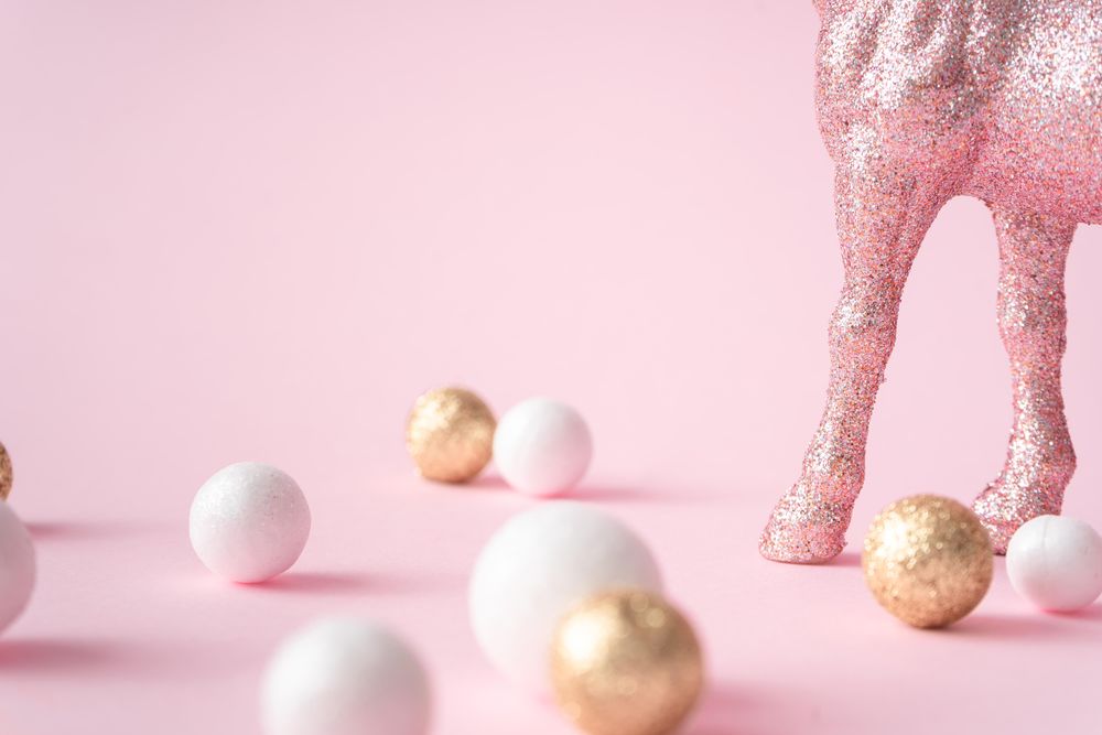 Pink glitter horse legs with gold and shiny decorations