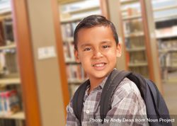 Hispanic Student Boy with Backpack in the Library 5kRPmQ