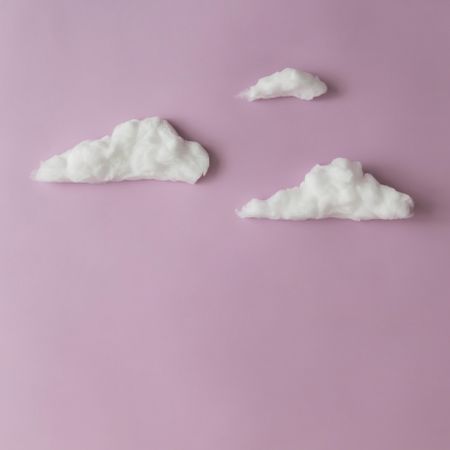 Clouds on light purple background