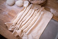 Prepared bread dough for making baguettes