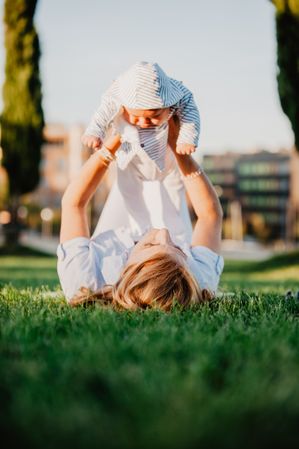 baby in the arms of his grandmother