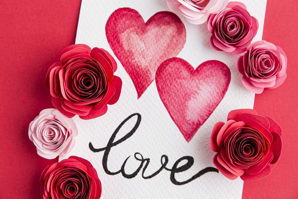 Beautiful valentine’s day concept with paper roses