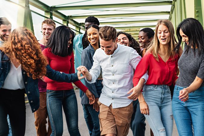 Multiethnic people carefree walking together