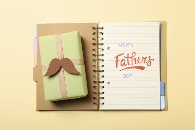 Happy father's day inscription, inscription in notebook, with gifts.